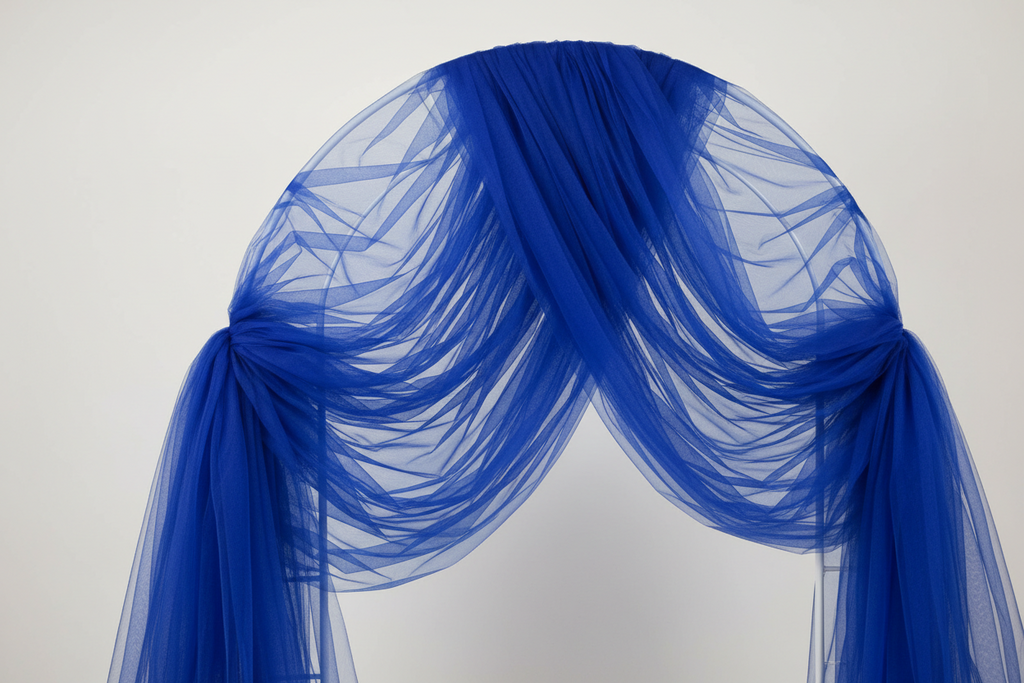Vibrant royal blue tulle arch
